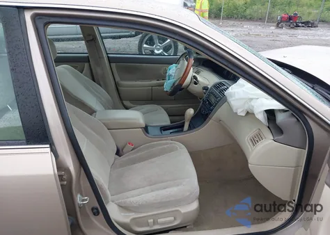 2001 Toyota Avalon Xl/Xls z USA, uszkodzony, nr VIN 4T1BF28B21U190012